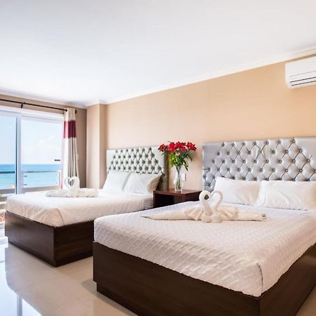 Em Royalle Hotel & Beach Resort Сан Хуан Екстериор снимка