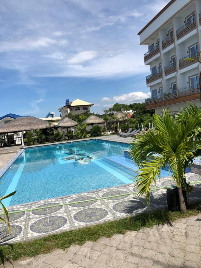 Em Royalle Hotel & Beach Resort Сан Хуан Екстериор снимка