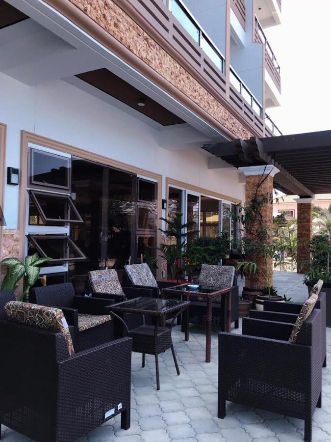 Em Royalle Hotel & Beach Resort Сан Хуан Екстериор снимка